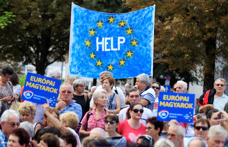 People attend a demonstration against Hungary's Prime Minister Viktor Orban in Budapest, Hungary, September 16, 2018. REUTERS/Bernadett Szabo