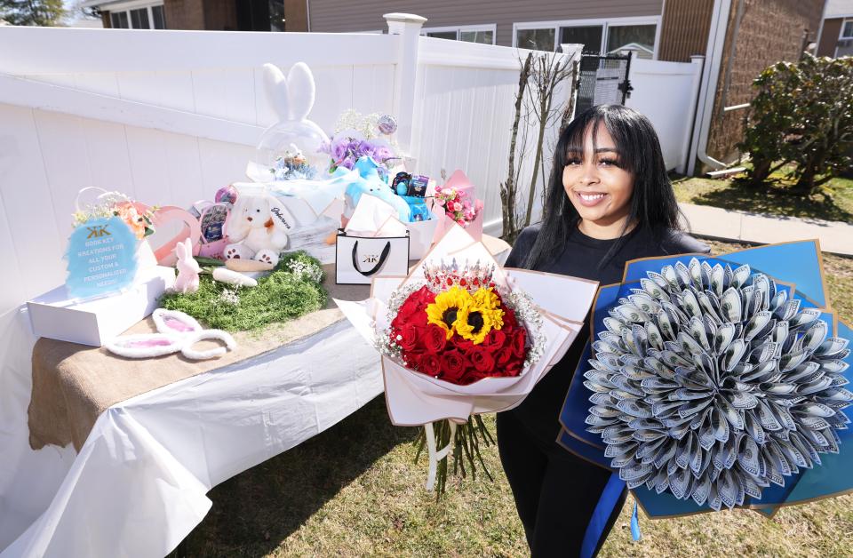 Kianna Marques designs items at her Brockton home on Wednesday, March 13, 2024.