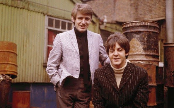 Paul McCartney with his brother Mike in 1965 - Getty