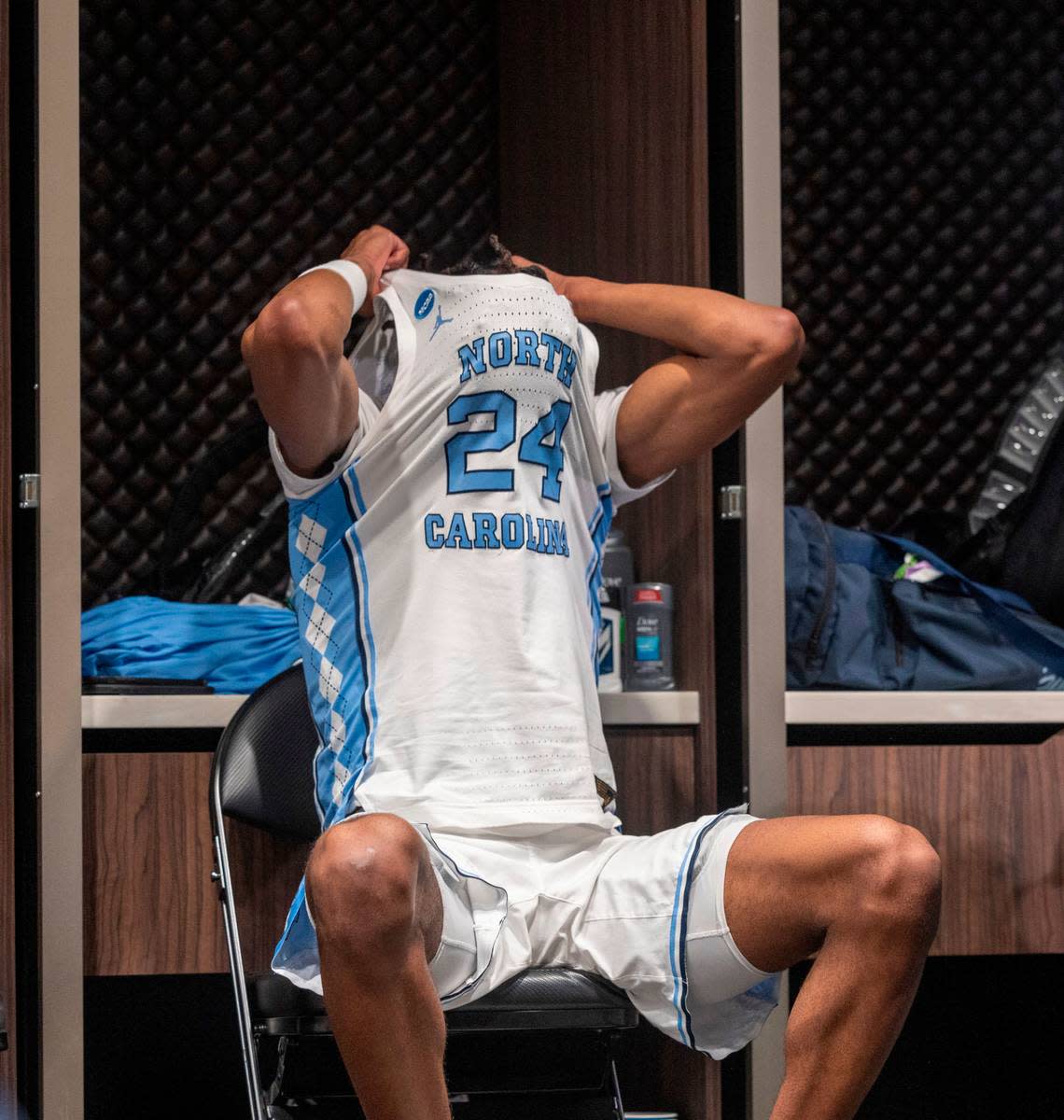 North Carolina’s Jae’Lyn Withers (24) covers his head inside the Tar Heels’ locker room following their 89-87 loss to Alabama in the West Regional Sweet Sixteen on Thursday, March 28, 2024 at Crypto.com Arena in Los Angeles, CA.