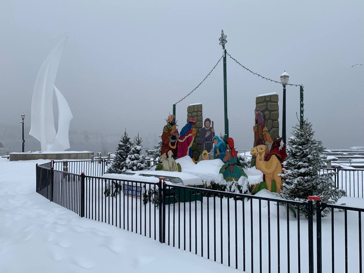 Much of B.C.'s southern Interior will continue to get heavy snow Friday evening and Christmas Eve Saturday, according to Environment and Climate Change Canada. (Winston Szeto/CBC - image credit)