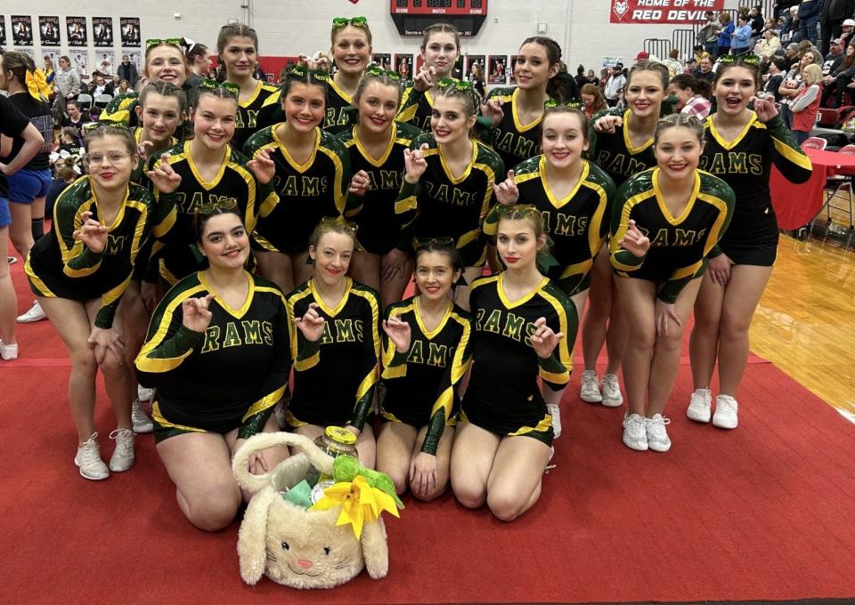 Flat Rock celebrates after taking second in the Division 3 Competitive Cheerleading District at Grosse Ile Friday night. The Rams move on to the Regional at Novi next week.