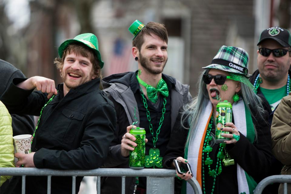 BOSTON, MA - MARCH 20: Paradegoers watch as the annual South Boston St. Patrick's Parade passes on March 20, 2016 in Boston, Massachusetts. According to parade organizers, the South Boston St. Patrick's Parade is listed as the second longest parade in the country. (Photo by Scott Eisen/Getty Images)