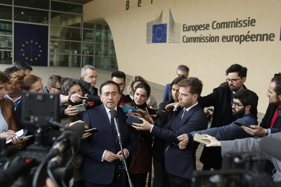 Spain's Foreign Minister Jose Manuel Albares Bueno speaks with the media outside EU headquarters in Brussels, Friday, April 12, 2024. British and Spanish foreign ministers are scheduled to meet Friday with a top European Commission official for another round of negotiations over the status of the disputed territory of Gibraltar following Britain's exit from the European Union. (AP Photo/Omar Havana)