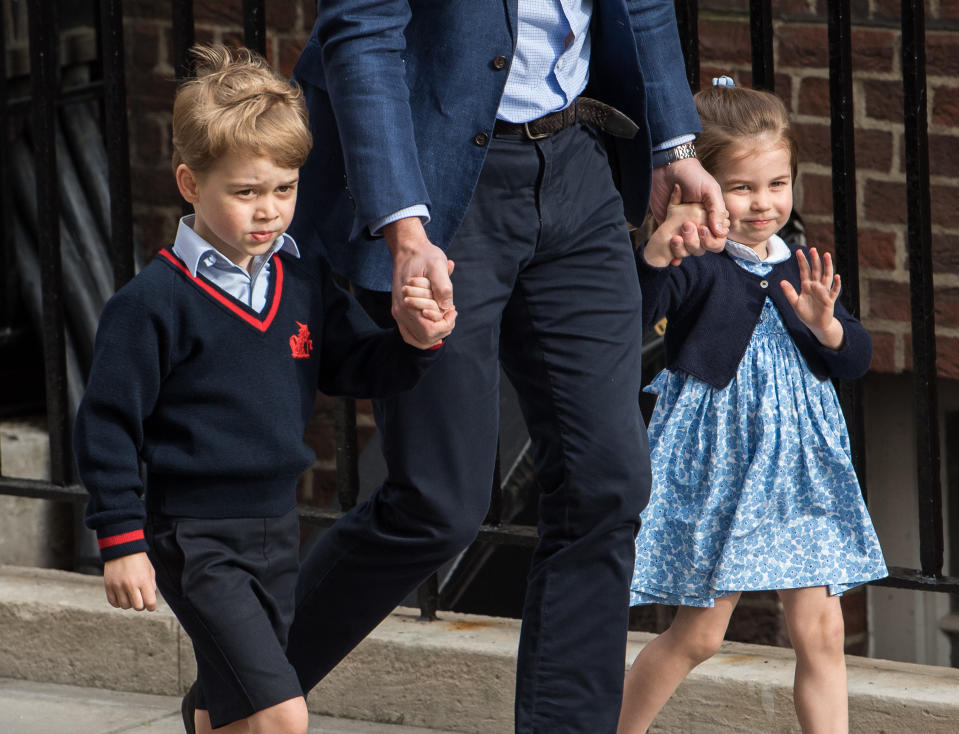 LONDON, ENGLAND - APRIL 23:  Prince William, Duke of Cambridge arrives with Prince George and Princess Charlotte at the Lindo Wing after Catherine, Duchess of Cambridge gave birth to their son at St Mary's Hospital on April 23, 2018 in London, England. The Duchess safely delivered a boy at 11:01 am, weighing 8lbs 7oz, who will be fifth in line to the throne..  (Photo by Samir Hussein/WireImage)