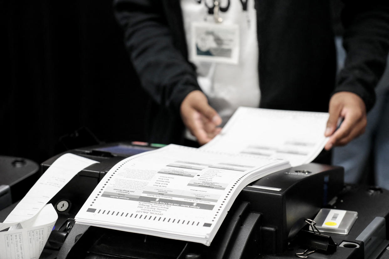 The Detroit Department of Elections performs a public accuracy test of their equipment, which is made by Dominion Voting Systems, on July 28, 2022, in advance a primary election. (Jeff Kowalsky / AFP via Getty Images file)
