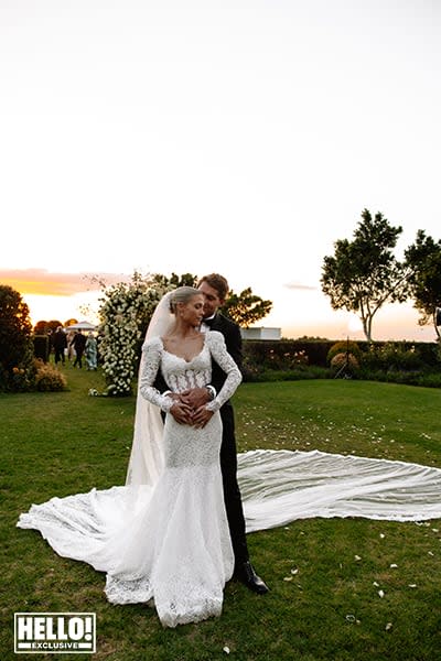 Greg Mallett lovingly holds his wife Lady Amelia Spencers waist as the newly wed couple pose together