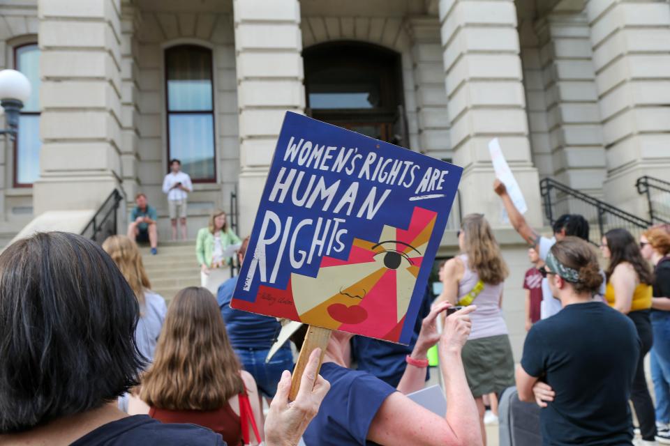 More than 100 people gathered at the Tippecanoe County Courthouse in Lafayette, Ind., June 24, 2022, hours after the U.S. Supreme Court ruled 6-3 to overturn Roe v. Wade, the landmark decision that gave a woman the right to an abortion 50 years ago.