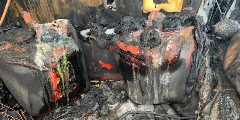 Gas tanks inside the Hummer are pictured above burned.