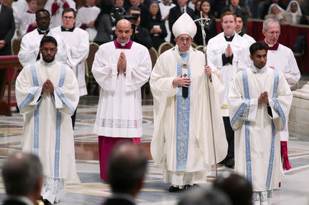 Pope Francis leaves after leading a mass to mark the World Day of Peace in Saint Peter's Basilica at the Vatican, January 1, 2019. REUTERS/Tony Gentile