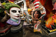 Parts of Mardi Gras floats created by Kern Studios sit stored inside Mardi Gras World in New Orleans, Friday, Feb. 12, 2021. New Orleans' annual pre-Lenten Mardi Gras celebration is muted this year because of the coronavirus pandemic. Parades canceled. Bars closed. Crowds suppressed. Mardi Gras joy is muted this year in New Orleans as authorities seek to stifle the coronavirus's spread. And it's a blow to the tradition-bound city's party-loving soul. (AP Photo/Gerald Herbert)