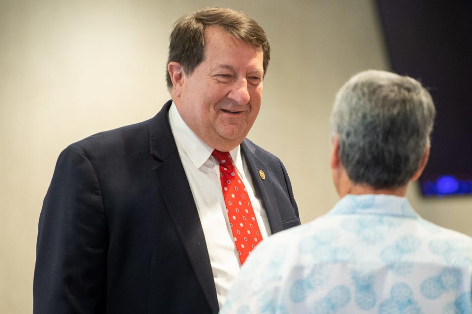 Mark Watson smiles as he speaks with guests during his retirement reception at the TownePlace Suites in Oak Ridge on Thursday, May 4, 2023. Watson retired on May 5 after serving as Oak Ridge's city manager for the last 12 years.
