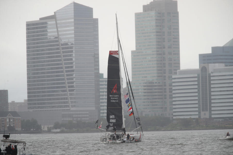 Greta Thunberg, a 16-year-old Swedish climate activist, sails into New York harbor aboard the Malizia II, Wednesday, Aug. 28, 2019. The zero-emissions yacht left Plymouth, England on Aug. 14. She is scheduled to address the United Nations Climate Action Summit on Sept. 23. (AP Photo/Mary Altaffer)