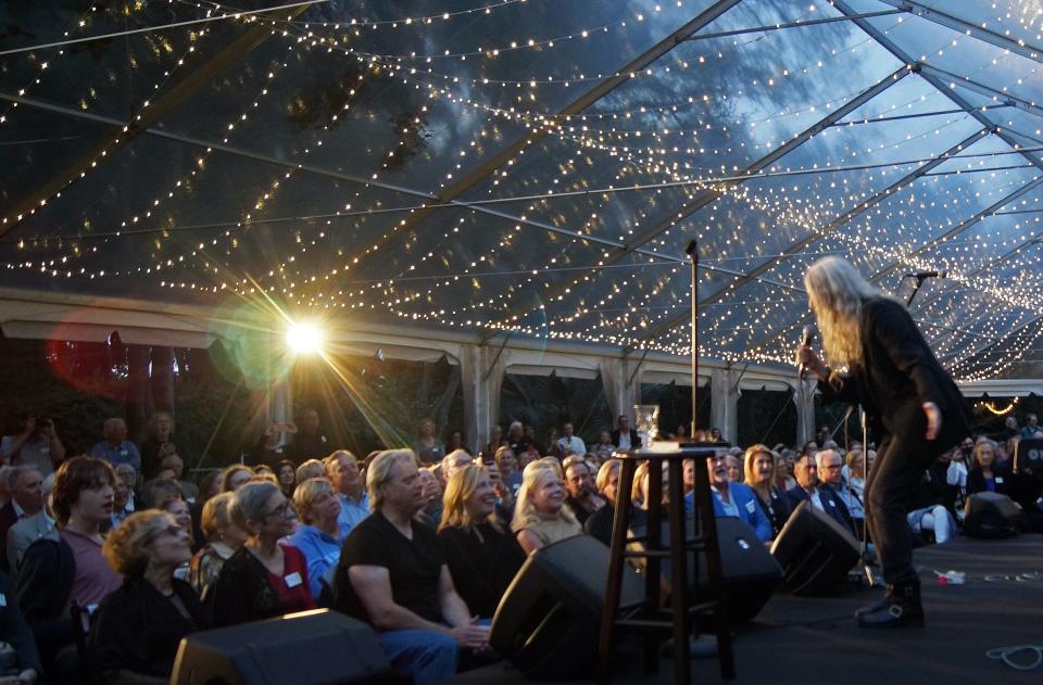 Patti Smith has the audience in her thrall as she performs “Because the Night,” the hit song from her 1978 album “Easter,” on Tuesday evening at Marie Selby Botanical Gardens in Sarasota.