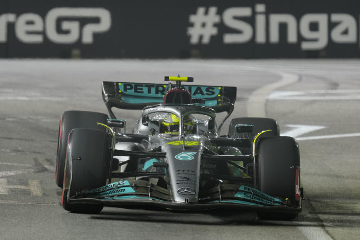 Mercedes driver Lewis Hamilton of Britain steers his car during practice session of the Singapore Formula One Grand Prix, at the Marina Bay City Circuit in Singapore, Friday, Sept. 30, 2022. (AP Photo/Vincent Thian)