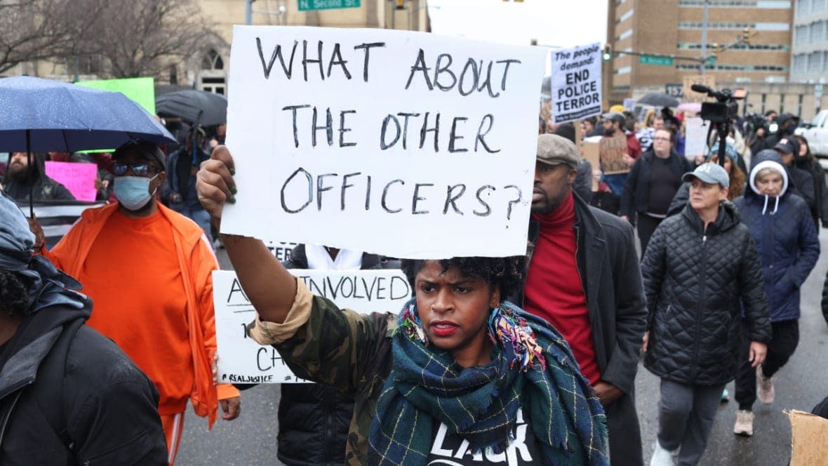 Demonstrators march through downtown Memphis on Jan. 28, 2023 to protest the death of Tyre Nichols. (Photo: Scott Olson/Getty Images)