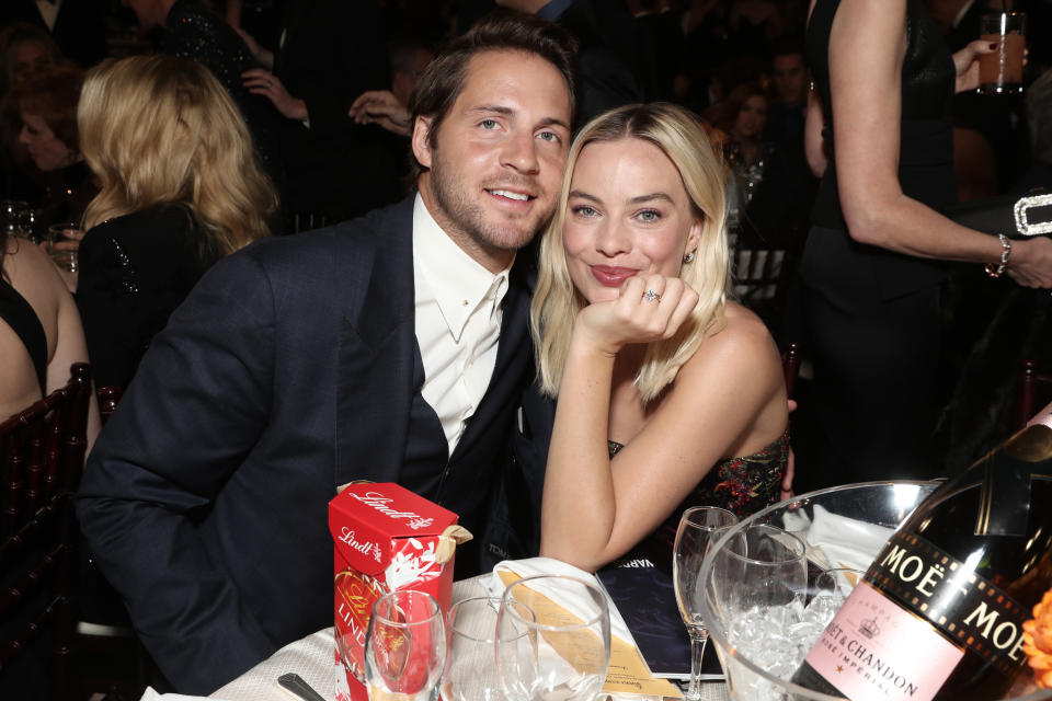 Closeup of Tom Ackerley and Margot Robbie