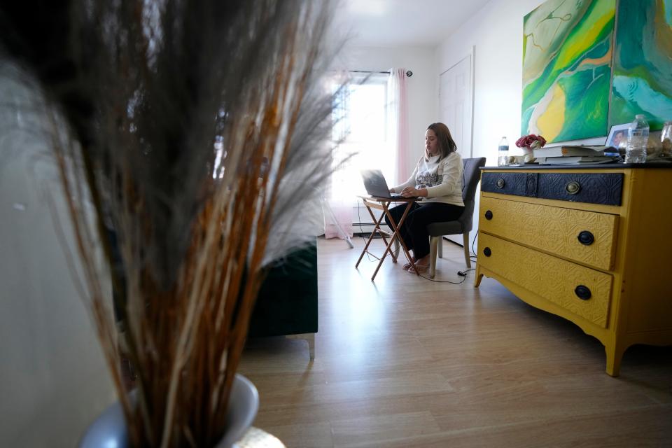 Morenia Acosta is shown as she works on her studies from her home in Paterson. Wednesday, February 1, 2023