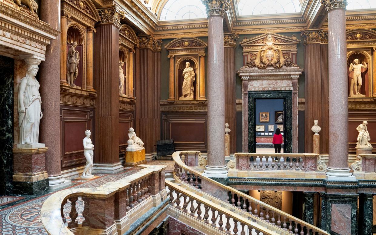 Dr Rebecca Birrell, one of the museum's curators, looks into one of the galleries