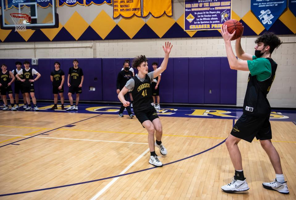 OLSH's Jake DiMichele, right, does drills with his teammates during practice Tuesday. [Lucy Schaly/For BCT]