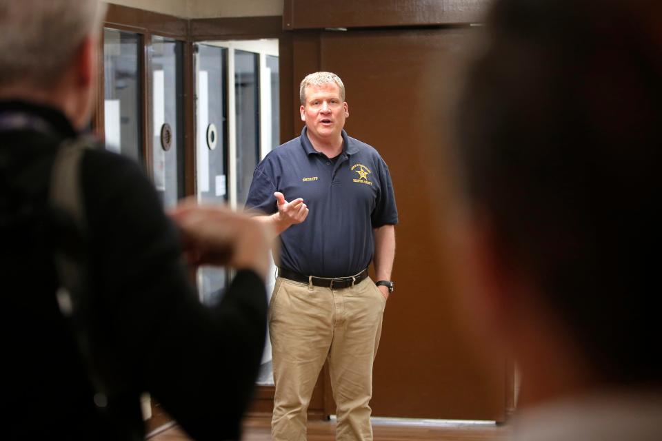 Bristol County Sheriff Paul Heroux speaks in front of the units at the Dartmouth House of Correction that were damaged by inmates in this file photo.