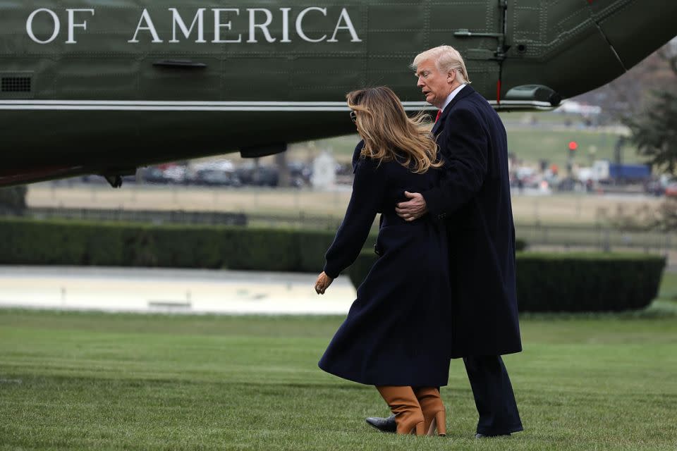 Donald's face says it all as he watches his wife trip. Photo: Getty