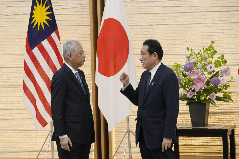 Japan's Prime Minister Fumio Kishida, right, and Malaysian Prime Minister Ismail Sabri Yaakob, left, speak after exchanging memorandum at the Prime Minister's official residence Friday, May 27, 2022 in Tokyo. (AP Photo/Eugene Hoshiko, Pool)