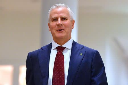 Australia's Minister for Veterans' Affairs Michael McCormack reacts as he walks to a meeting of the country's National Party in Canberra, Australia, February 26, 2018. AAP/via REUTERS