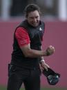 Australia's Lucas Herbert celebrates after he won the Dubai Desert Classic golf tournament in Dubai, United Arab Emirates, Sunday, Jan. 26, 2020. (AP Photo/Kamran Jebreili)