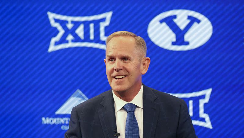 BYU athletic director Tom Holmoe speaks at a press conference announcing that BYU has accepted an invitation to the Big 12 Conference at BYU in Provo on Friday, Sept. 10, 2021. On Tuesday, Dec. 5, 2023, Holmoe received the prestigious John L. Toner Award in Las Vegas.