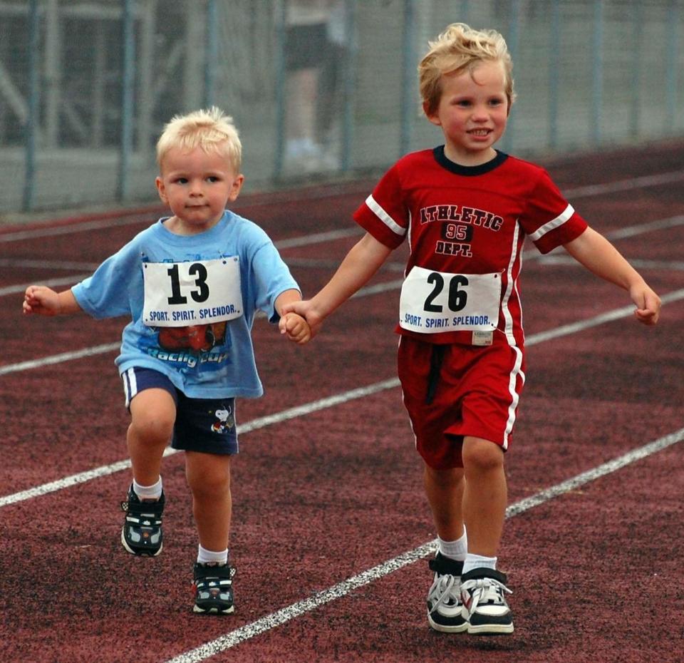 An older boy helped Chase finish a 400 meter run. The CMAK Foundation honors this spirit of kindness, which Chase possessed as well.  (Photo: Via The CMAK Foundation)