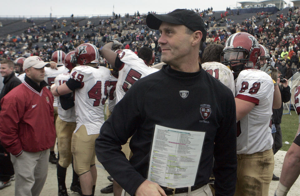 FILE - Harvard football coach Tim Murphy smiles as his team celebrates beating Yale 37-6 to win the Ivy League title at the Yale Bowl in New Haven, Conn., Saturday, Nov. 17, 2007. Harvard coach Tim Murphy, the winningest coach in Ivy League history, announced his retirement Wednesday, Jan. 17, 2024, after 30 years at the school. (AP Photo/Bob Child, File)