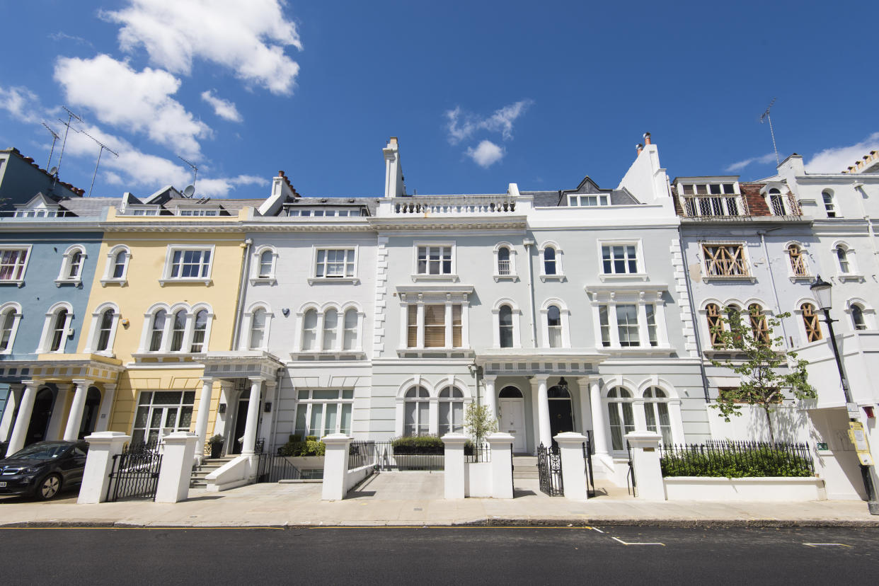 House prices: A row of houses in Elgin Crescent, in Notting Hill, London, where a terraced house is currently for sale for over �12 million. The borough of Kensington and Chelsea is one of the most polarised in Great Britain, with some of the most expensive real estate in the UK just a short walk from several of the most deprived wards in the country - including the area around the Grenfell Tower. Picture date: Wednesday July 12th, 2017. Photo credit should read: Matt Crossick/ EMPICS Entertainment.