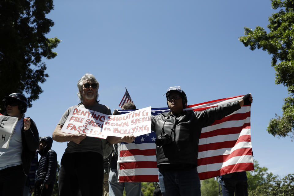 Demonstrators gathered near the University of California, Berkeley campus amid a strong police presence and rallied to show support for free speech and condemn the views of Ann Coulter and her supporters. (AP Photo/Marcio Jose Sanchez)