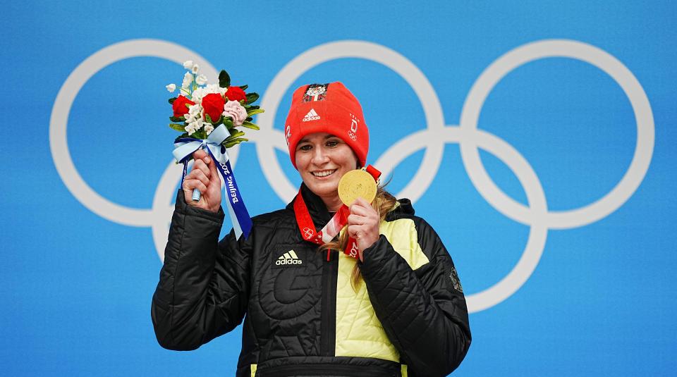 Gold medallist Natalie Geisenberger of Germany attends the awarding ceremony after women's singles run of luge event at the Yanqing National Sliding Centre in Yanqing district of Beijing, capital of China, Feb. 8, 2022. (Photo by Jiang Wenyao/Xinhua via Getty Images)