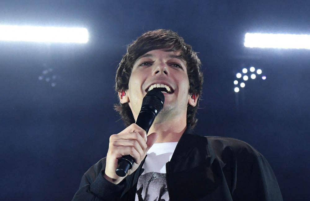 Louis Tomlinson is hard at work on his second solo album credit:Bang Showbiz