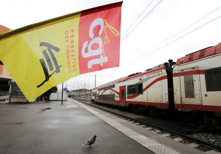 A CGT labour union flag is seen on a platform at the Nice railway station on the second day of a nationwide strike by French SNCF railway workers in Nice, France, April 4, 2018. REUTERS/Eric Gaillard