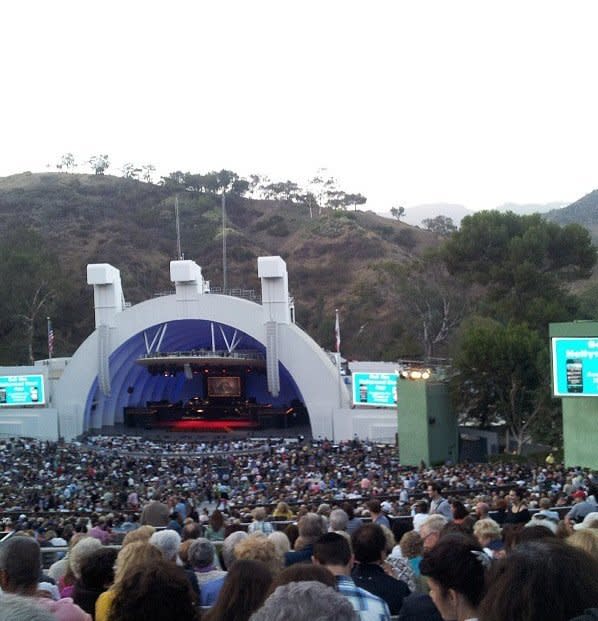 Clocking in at the largest natural amphitheater in the United States, the Hollywood Bowl is a wondrously gigantic and magical site. With nearly 18,000 seats, there's a group mentality as everyone cheers for their favorite artist or sways back and forth together during a closing number. The <a href="http://www.history.com/this-day-in-history/hollywood-bowl-opens" target="_blank">first performance</a> ever was by the Los Angeles Philharmonic in 1922.