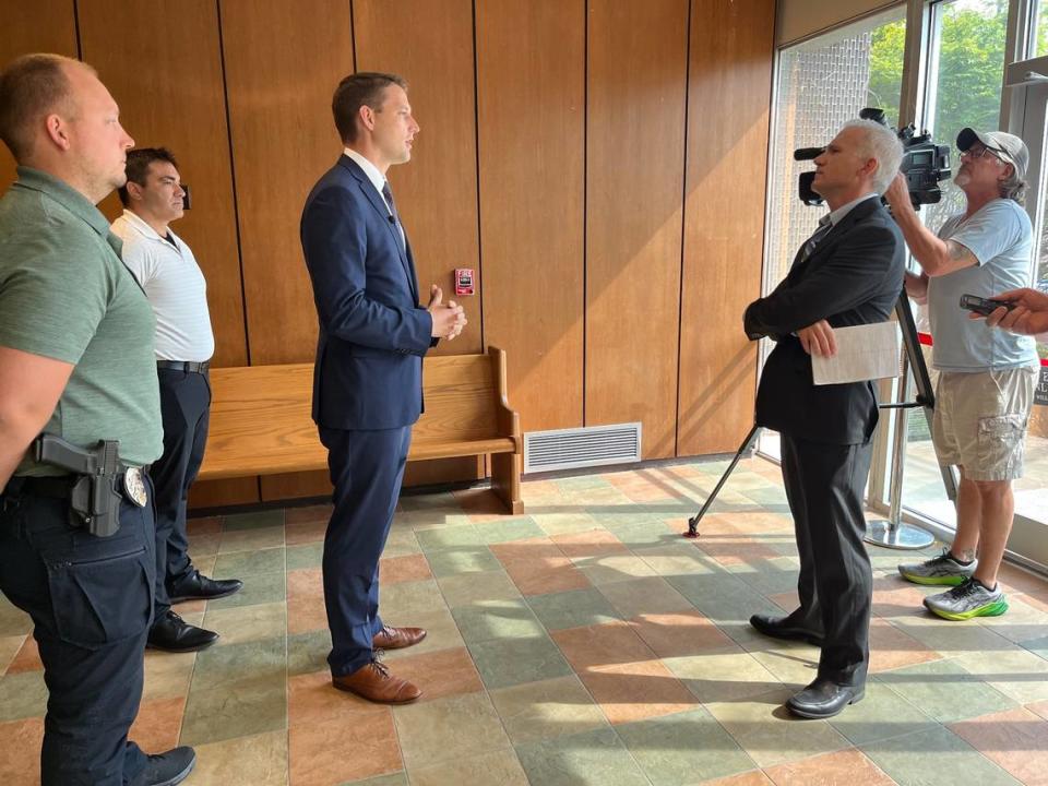 Madison County State’s Attorney Tom Haine talks to reporters after a hearing Tuesday, when Richard Mayor was sentenced to 60 years in prison for hitting and killing his girlfriend with his truck in Pontoon Beach.