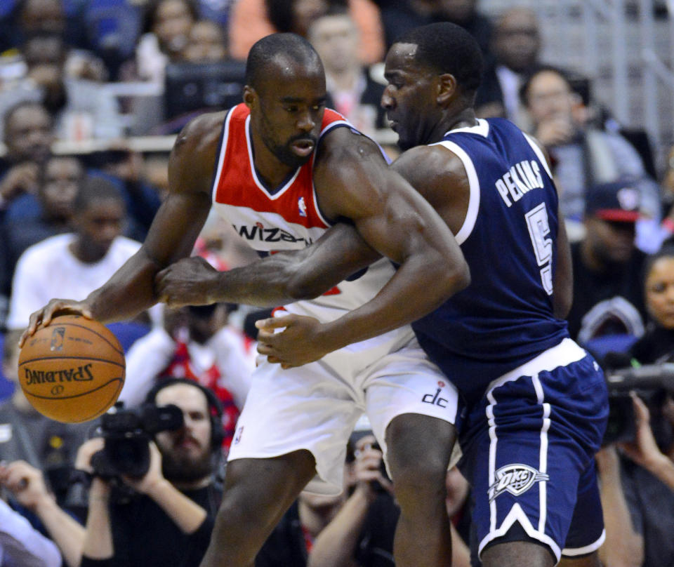 Emeka Okafor and Kendrick Perkins do battle, either several lifetimes ago or in 2013. (Harry E. Walker/MCT)