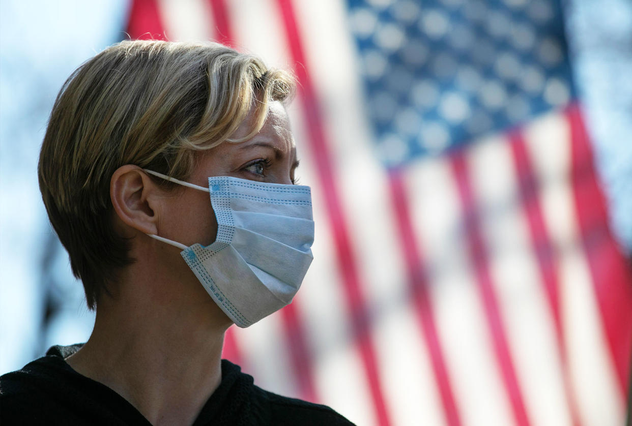 Coronavirus; COVID-19; Face Mask; American Flag John Moore/Getty Images