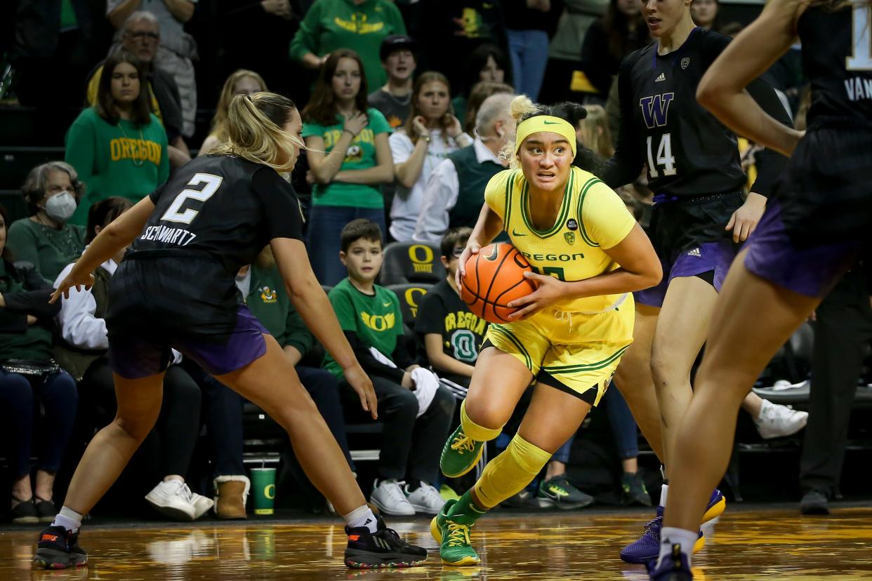 Oregon guard Te-Hina Paopao looks for room to move as the Oregon Ducks host the Washington Huskies Friday, Jan. 13, 2023, at Matthew Knight Arena in Eugene, Ore.