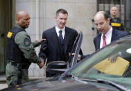 <p>Officer Edward Nero, center, one of six Baltimore police officers charged in connection with the death of Freddie Gray, leaves a courthouse after being acquitted on May 23, 2016. (Patrick Semansky/AP) </p>