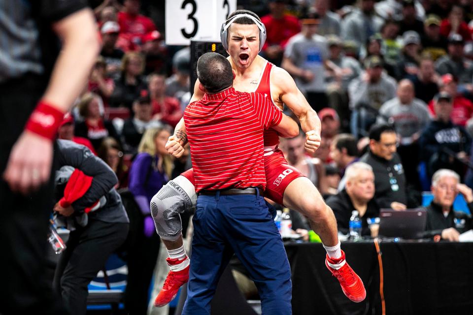 Wisconsin's Austin Gomez, shown last season after winning a match at the Big Ten Championships, is ranked No. 2 in the nation at 149 pounds this season.