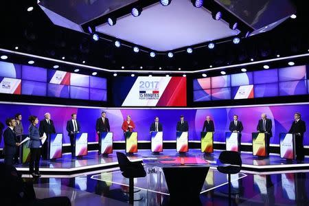 The eleven French presidential election candidates take part in a special political television show entitled "15min to Convince" at the studios of French Television channel France 2 in Saint-Cloud, near Paris, April 20, 2017. REUTERS/Martin Bureau/Pool