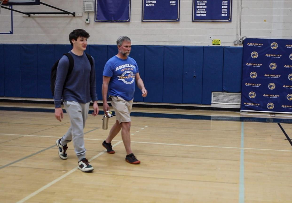 Ardsley High School senior with athletic trainer Douglas Sawyer in the school gym April 2, 2024. After suffering three concussions, Siden made the decision to stop playing football.