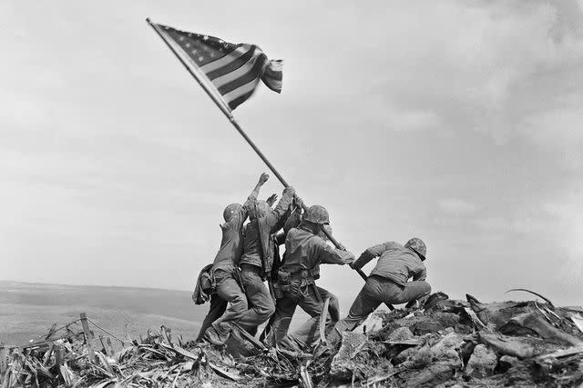 <p>AP Photo/Joe Rosenthal</p> U.S. Marines of the 28th Regiment, 5th Division, raise a U.S. flag atop Mount Suribachi, Iwo Jima, Japan, Feb. 23, 1945.