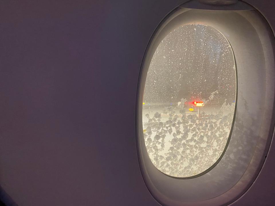 Frosty Finnair Plane window freelancer photo