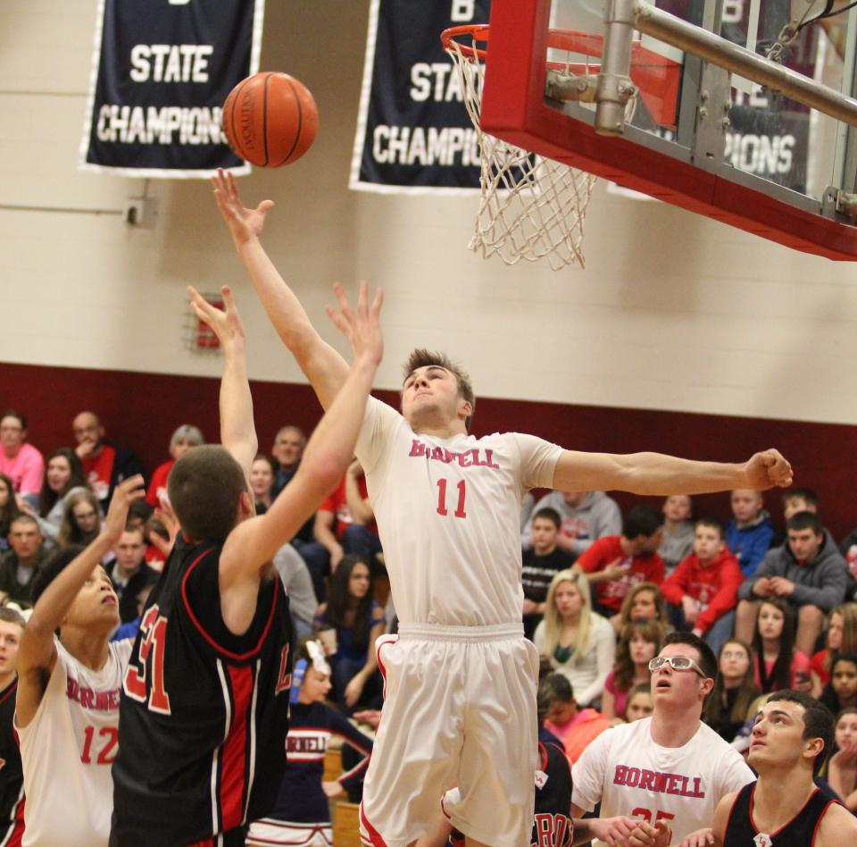 Hornell's Brendan Buisch skies for a rebound during the 2012-13 season. Buisch and five others will be inducted into the Hornell High School Sports Hall of Fame on Sept. 9 during halftime of the Red Raiders' varsity football game at Maple City Park.