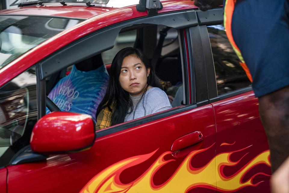 Nora (Awkwafina) moves out of her family's house and sleeps in her car in the first episode of "Awkwafina is Nora from Queens."